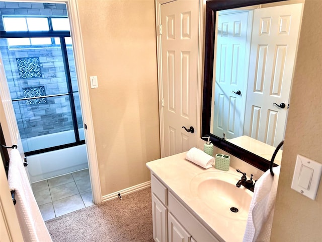 full bathroom featuring tile patterned floors, baseboards, shower / bath combination with glass door, and vanity