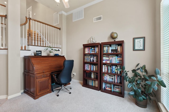 office space featuring baseboards, visible vents, and carpet flooring