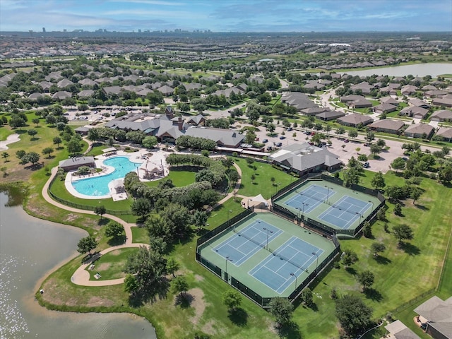 bird's eye view with a residential view and a water view