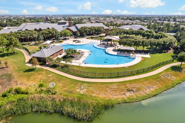 bird's eye view with a water view and a residential view