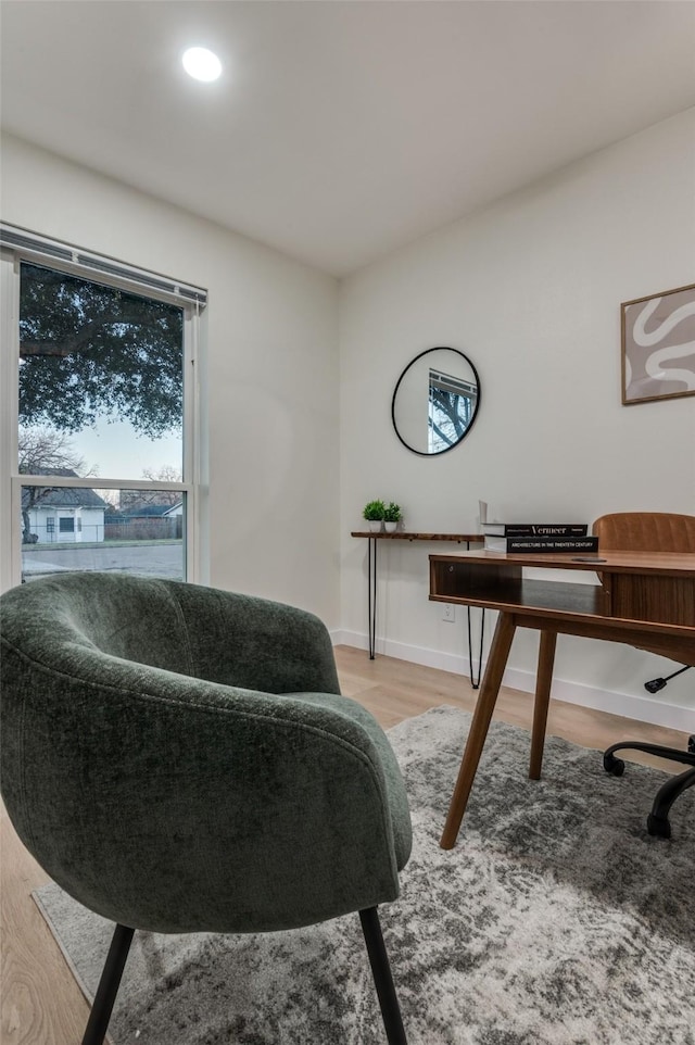 office space featuring recessed lighting, baseboards, and wood finished floors