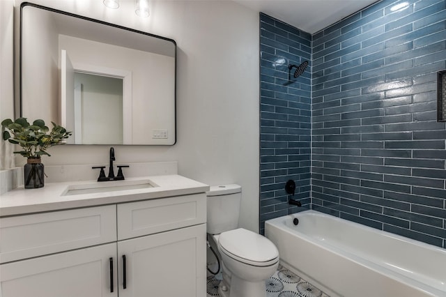 bathroom featuring toilet, washtub / shower combination, and vanity