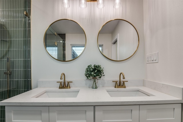 bathroom with a sink and double vanity