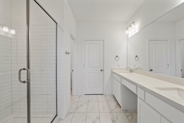 full bath with double vanity, a stall shower, marble finish floor, and a sink