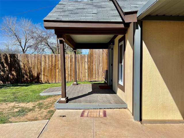 view of patio / terrace with fence and a wooden deck