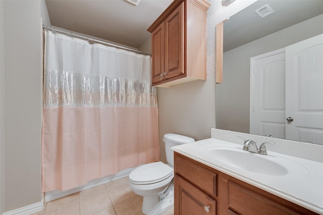 full bathroom with toilet, tile patterned floors, visible vents, and vanity