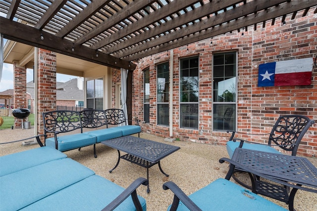 view of patio / terrace with grilling area and a pergola