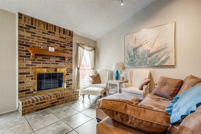 tiled living room with a brick fireplace, vaulted ceiling, and a textured ceiling