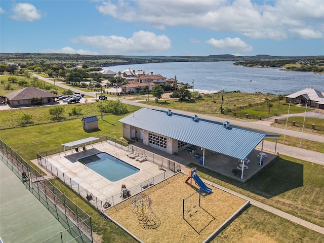 birds eye view of property featuring a water view