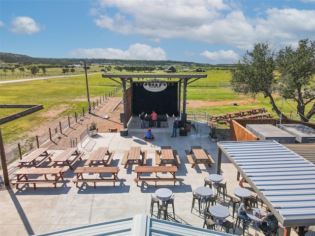 view of patio with a rural view