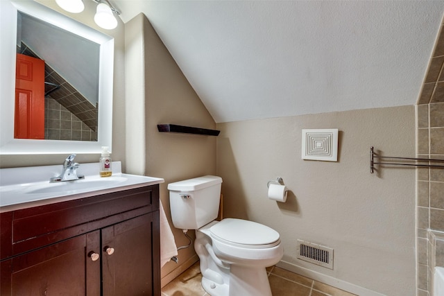 full bathroom featuring lofted ceiling, toilet, vanity, visible vents, and tile patterned floors