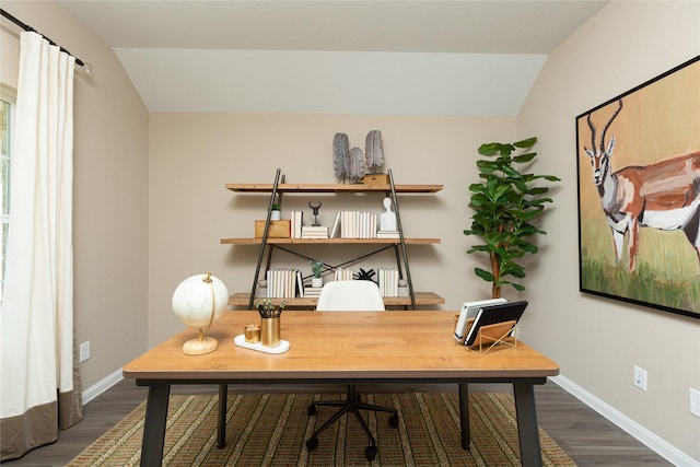 office with lofted ceiling, baseboards, and wood finished floors