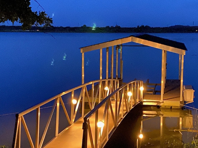 view of dock with a water view