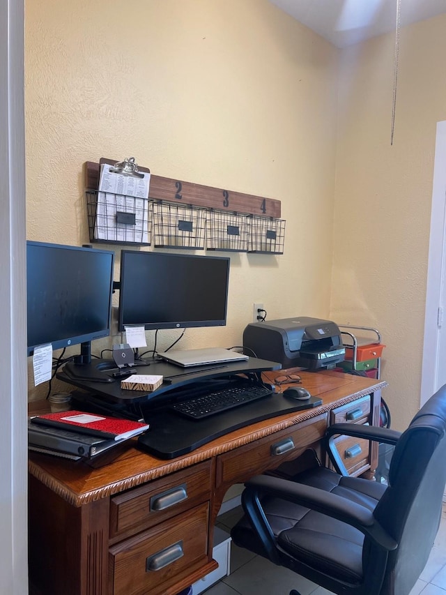 office area with tile patterned flooring