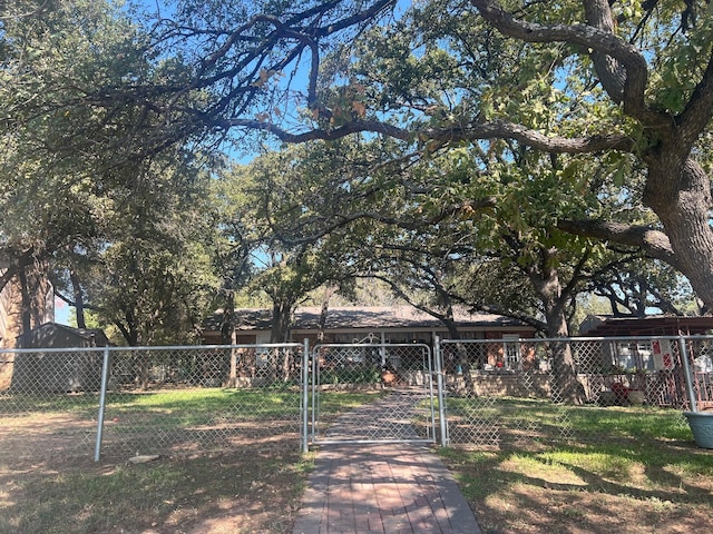 view of yard with a gate and fence