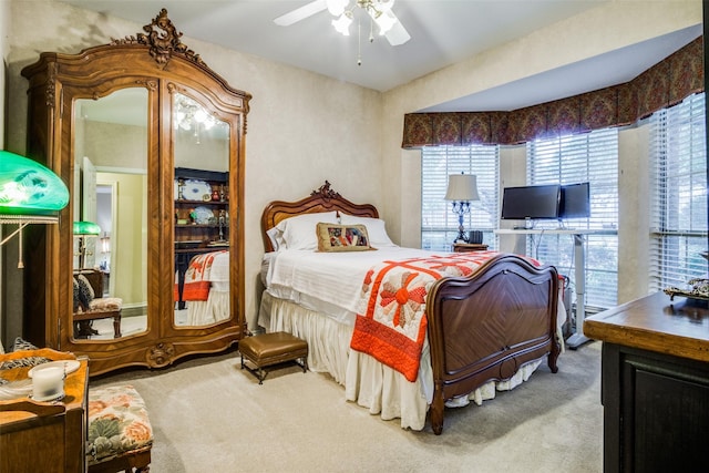 bedroom featuring carpet flooring and a ceiling fan