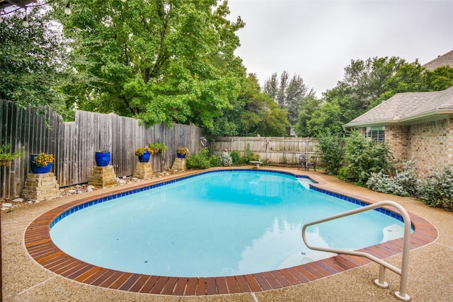 view of pool featuring a fenced backyard and a fenced in pool