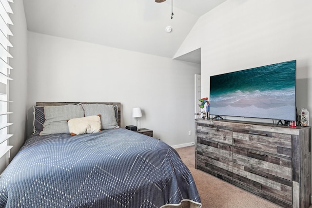 bedroom with lofted ceiling, carpet, baseboards, and ceiling fan
