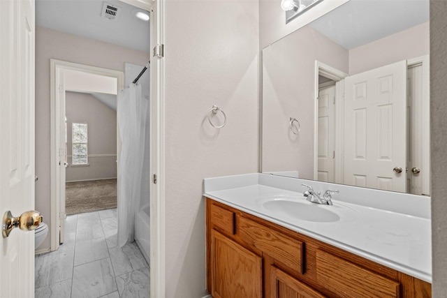 full bath featuring marble finish floor, shower / tub combo, vanity, and visible vents