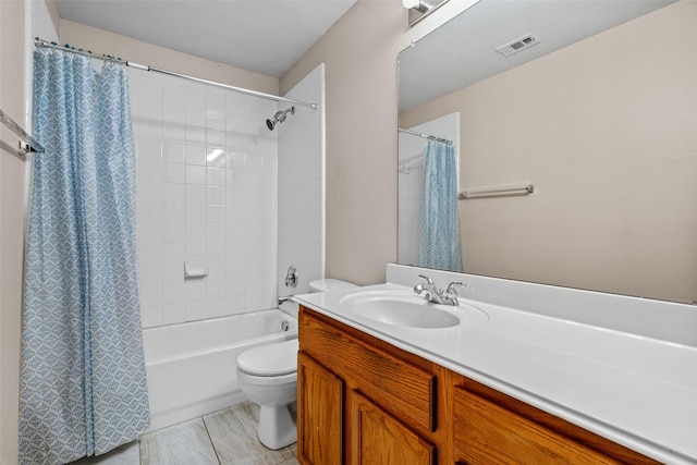 full bathroom with shower / tub combo, visible vents, vanity, and toilet