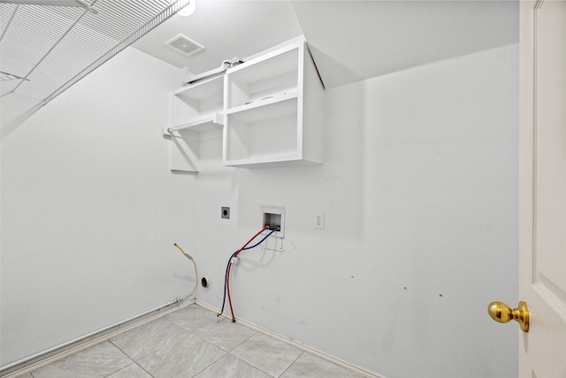 washroom featuring hookup for a washing machine, laundry area, visible vents, and hookup for an electric dryer