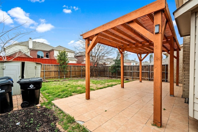 view of patio with a storage shed, an outdoor structure, a fenced backyard, and a pergola