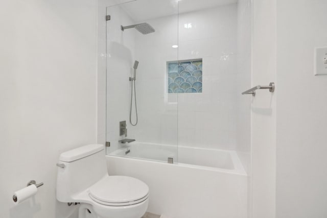 full bathroom featuring toilet and shower / bathtub combination