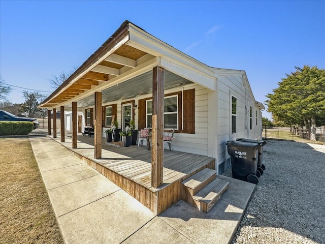 view of home's exterior featuring covered porch