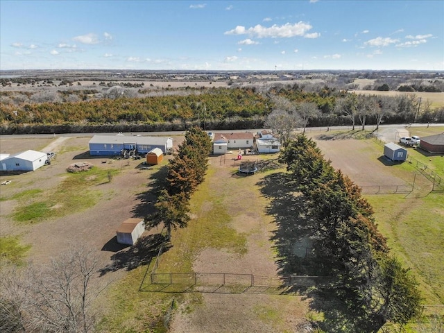 birds eye view of property with a rural view