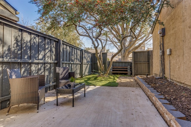 view of patio with a fenced backyard