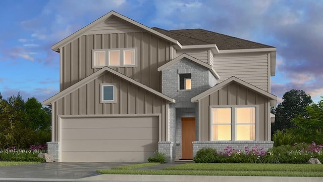 view of front facade featuring concrete driveway, a shingled roof, board and batten siding, and brick siding