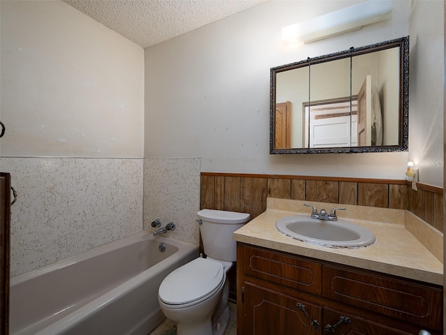 full bath with toilet, a wainscoted wall, a tub, a textured ceiling, and wood walls