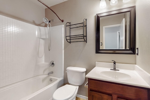 full bathroom featuring washtub / shower combination, a textured wall, vanity, and toilet