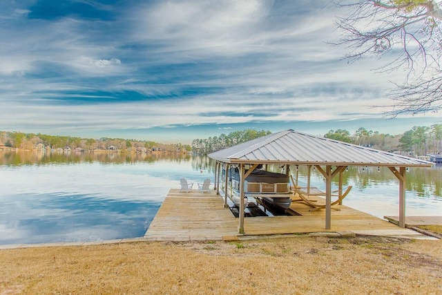 dock area featuring a water view and boat lift