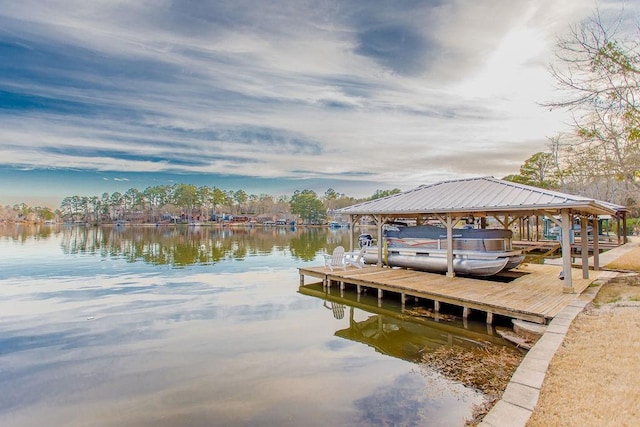 dock area featuring a water view and boat lift