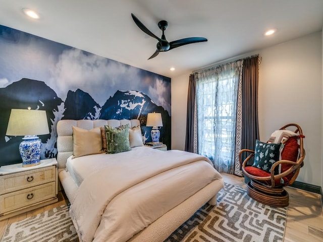 bedroom featuring a ceiling fan, recessed lighting, and wood finished floors