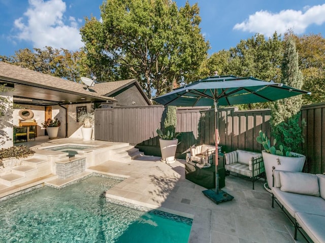 view of swimming pool featuring a fenced in pool, a patio, an in ground hot tub, a fenced backyard, and an outdoor living space