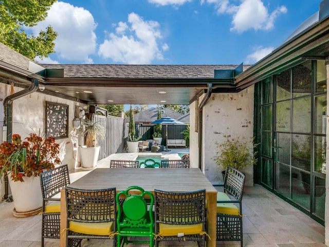 view of patio with outdoor dining area