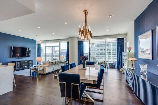 dining area featuring dark wood-style floors, a chandelier, and recessed lighting