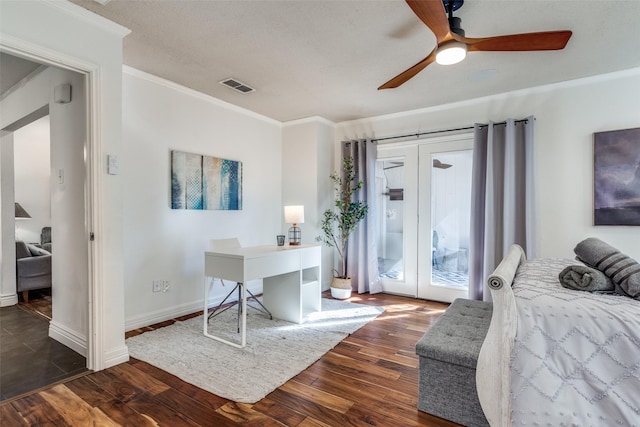 bedroom with access to outside, wood finished floors, visible vents, and crown molding