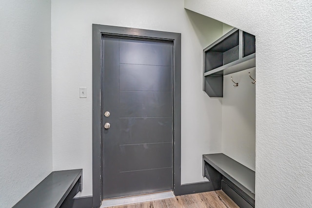 mudroom with wood finished floors