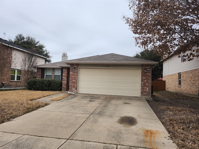 view of front of property with driveway, a garage, a shingled roof, a chimney, and brick siding