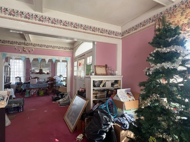 interior space with carpet and a textured ceiling