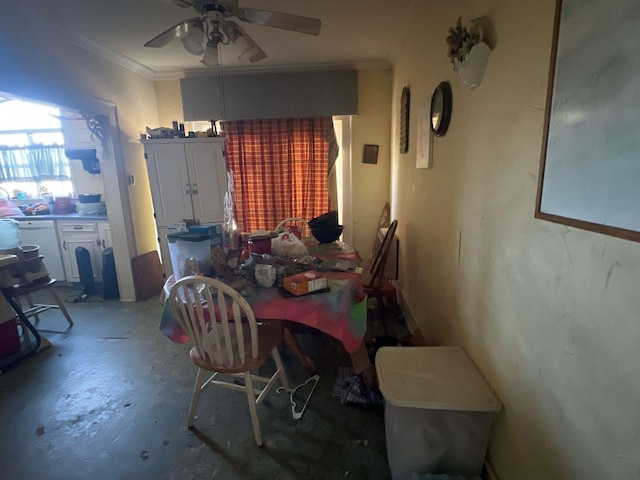 dining area with ornamental molding, ceiling fan, and unfinished concrete floors