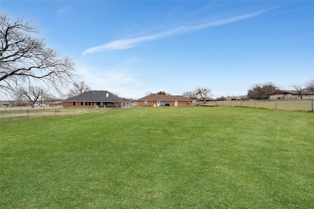 view of yard with fence