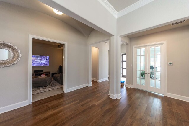 entryway featuring dark wood finished floors, french doors, baseboards, visible vents, and ornamental molding