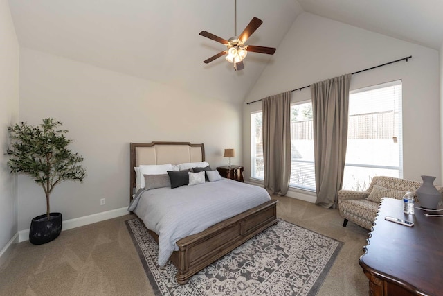 carpeted bedroom featuring high vaulted ceiling, baseboards, and a ceiling fan