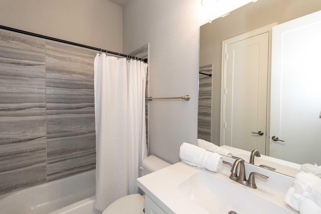 bathroom with vanity, shower / bathtub combination with curtain, and toilet