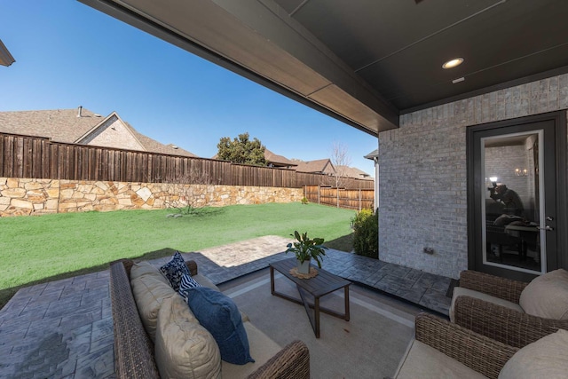 view of patio / terrace with a fenced backyard and outdoor lounge area