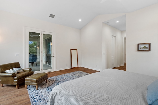 bedroom with visible vents, lofted ceiling, wood finished floors, access to exterior, and recessed lighting